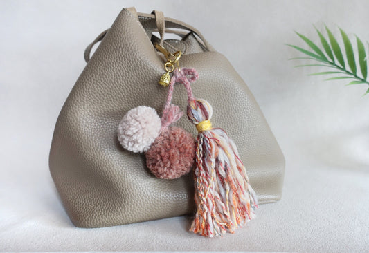 Pompoms and unique tassel bagcharm/ summer accessory