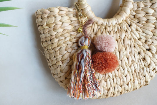 Pompoms and unique tassel bagcharm/ summer accessory